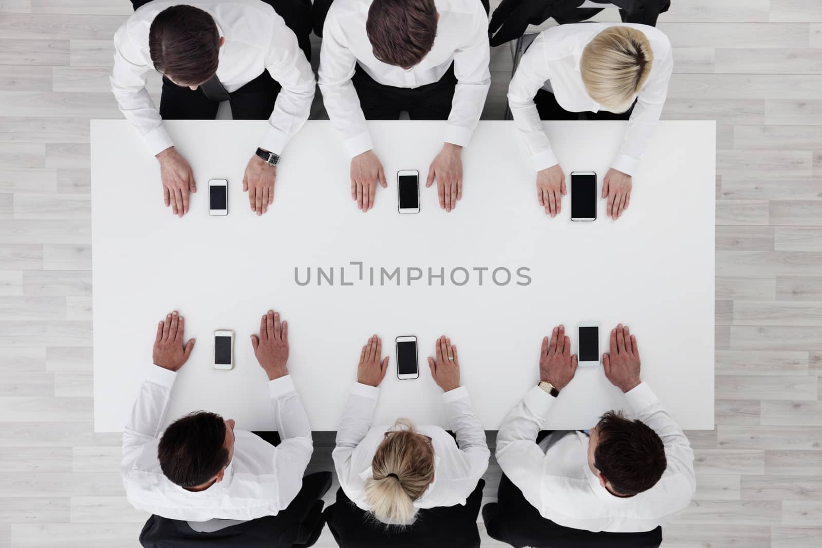 Business people and mobile phones by ALotOfPeople