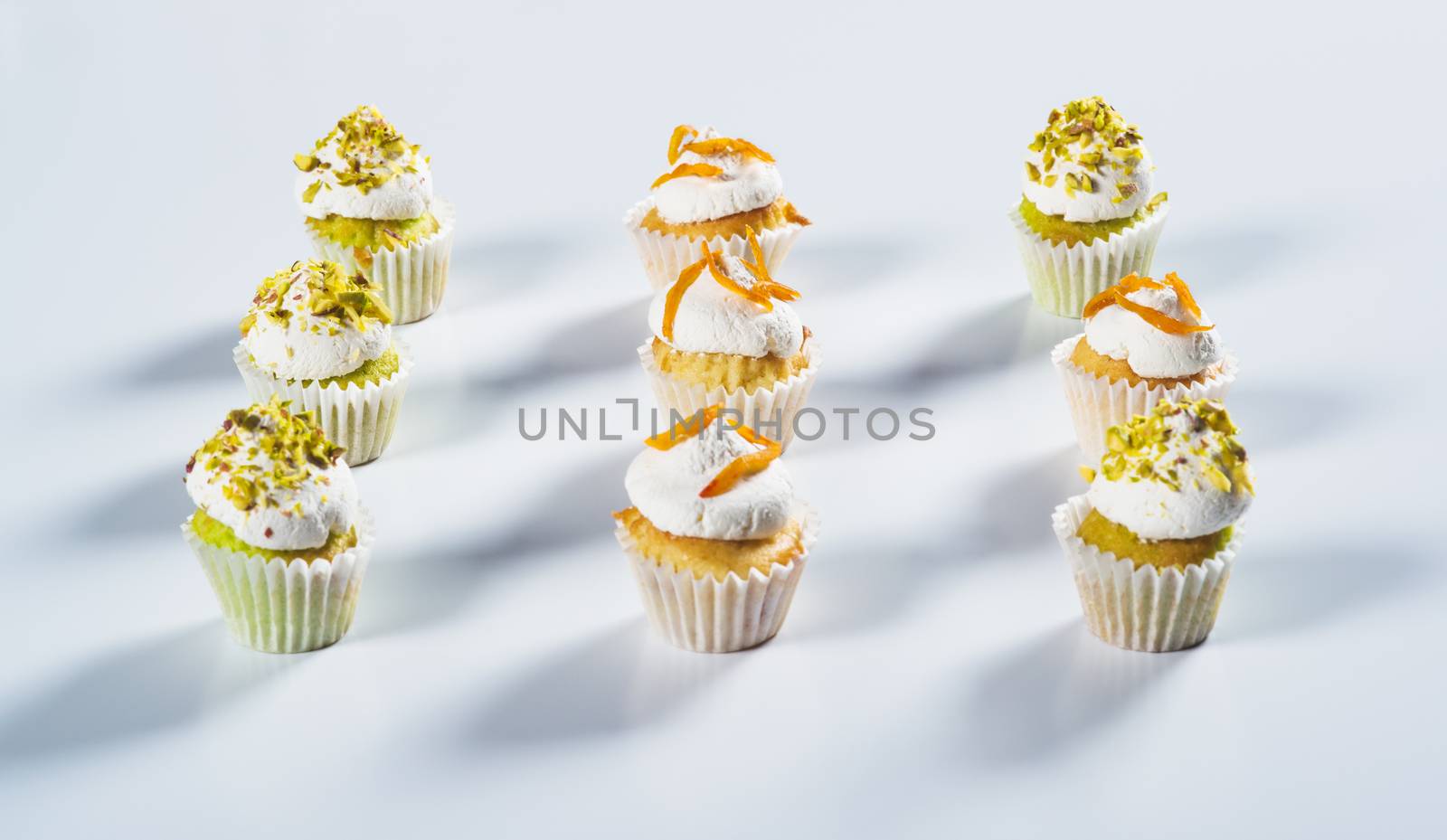 Lots small muffins with meringue on the top by kzen