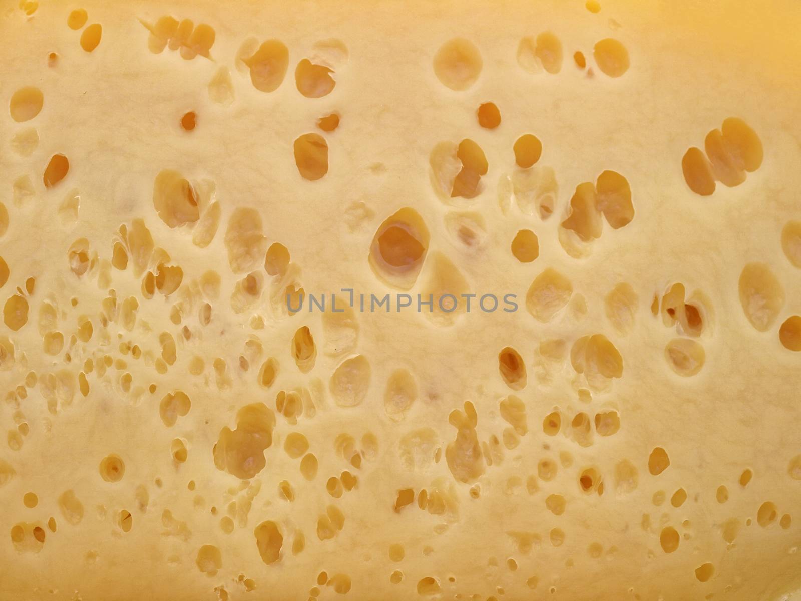 background of cheese with holes