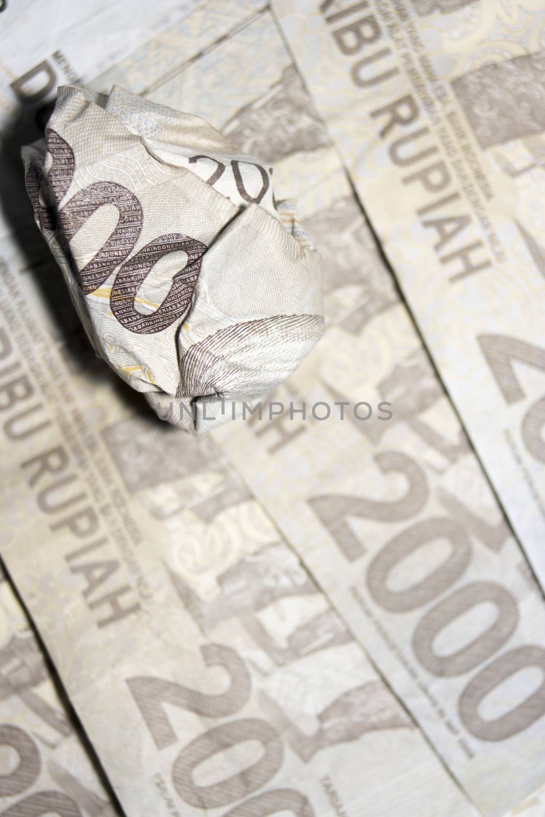 macro close up crumpled rupiah indonesia money by vector1st