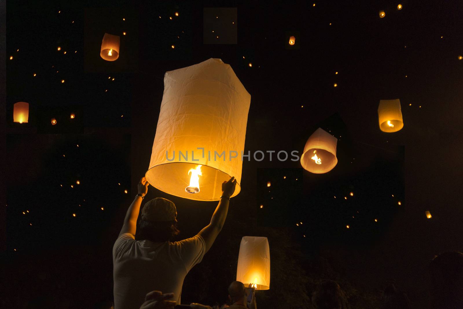 Loy Krathong Festival Balloon fire or yeepeng. Floating lantern on the Sky, flying lanterns, hot-air balloons in Chiang Mai,Thailand
