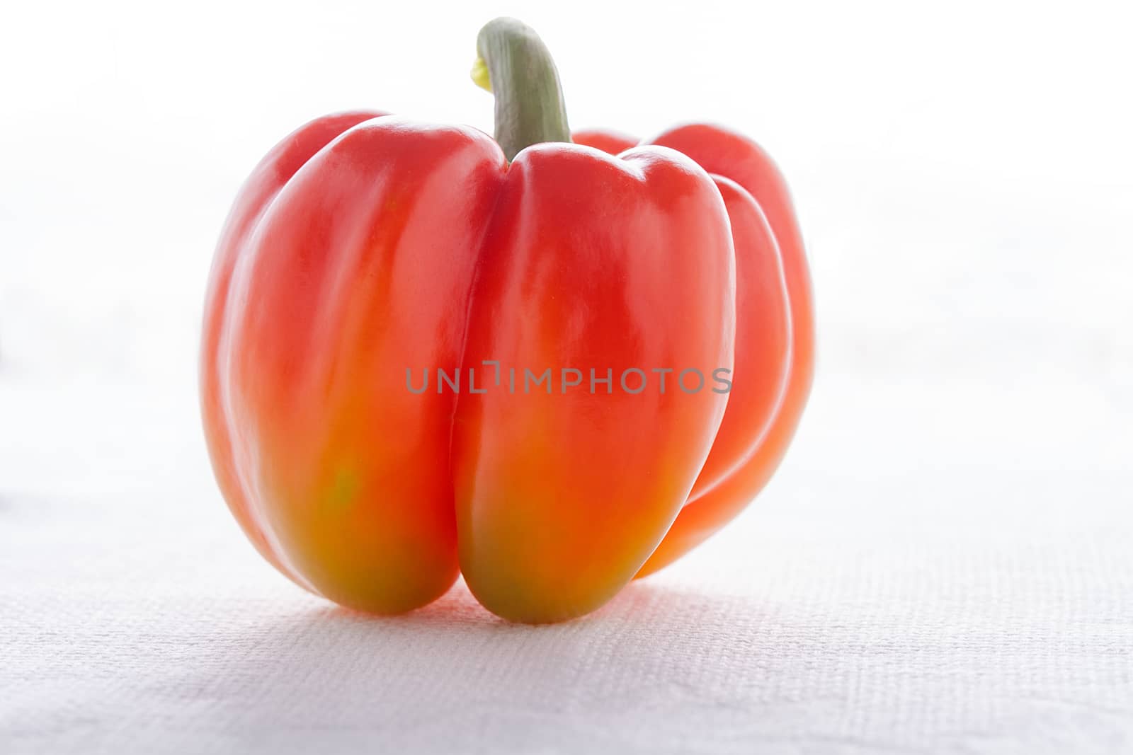 Fresh Red Pepper placed on white background
