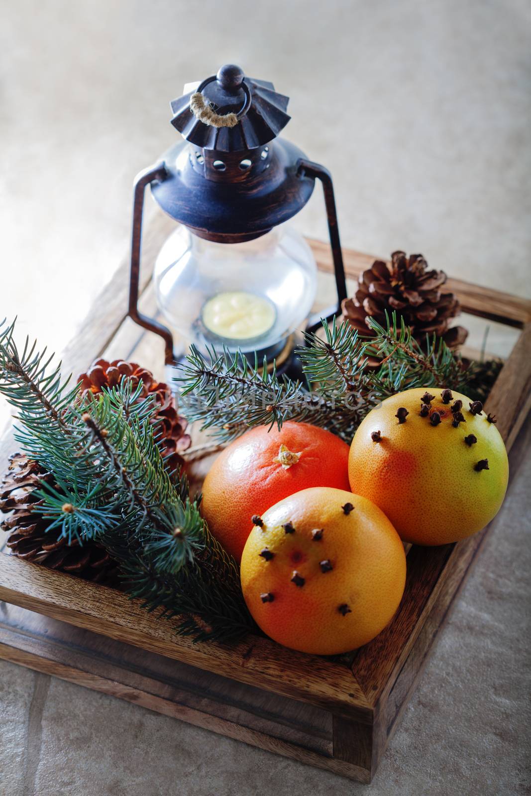 Christmas symbols including grapefruits in wooden box