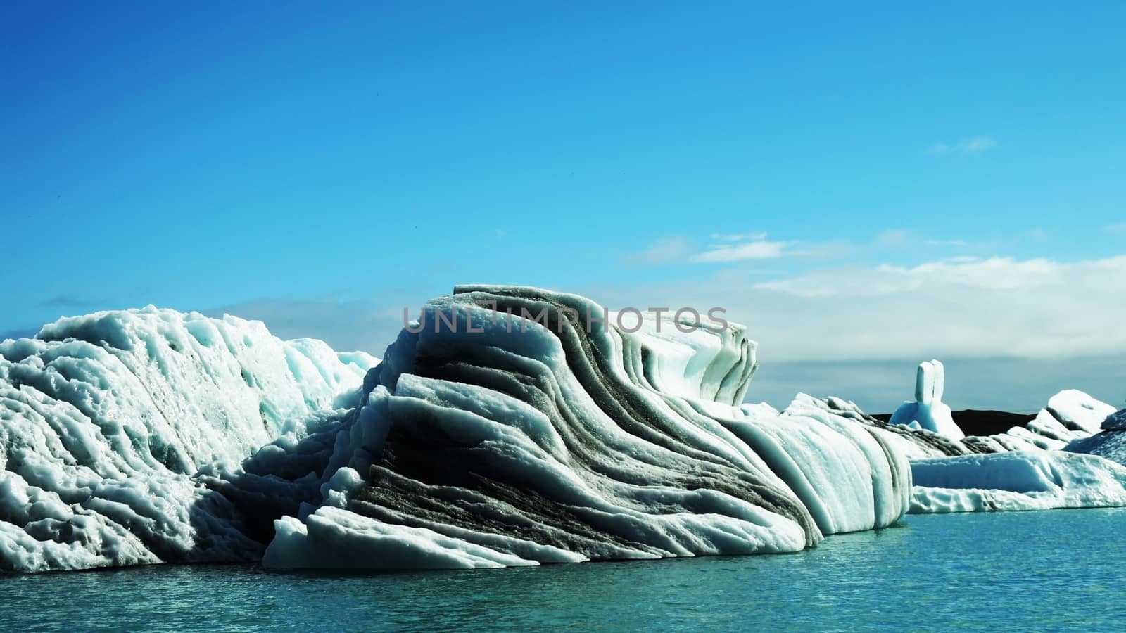 Lagoon Jokulsarlon, glacial lake and icebergs by homocosmicos