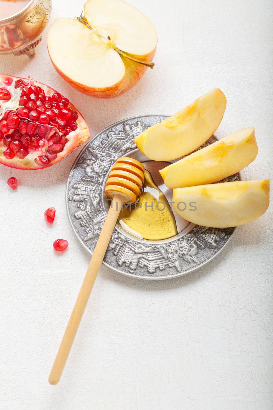 Apples, pomegranate and honey for Rosh Hashanah  by supercat67