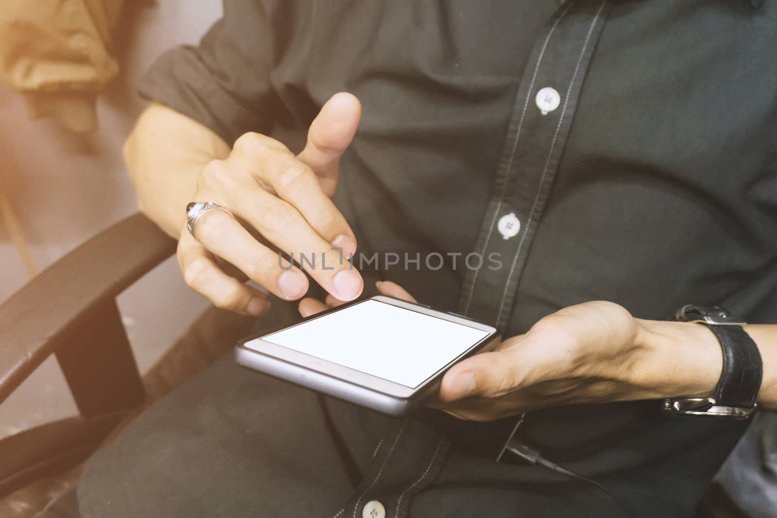 Asian business men holding and using smart phone with white blank empty screen.