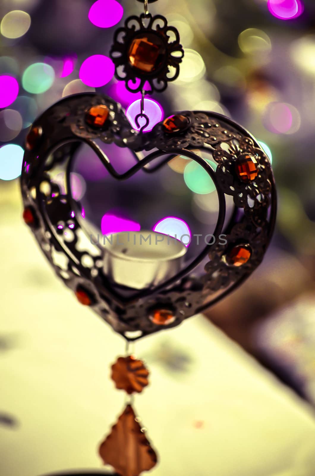 Iron heart with New Year lights, horizontal photo