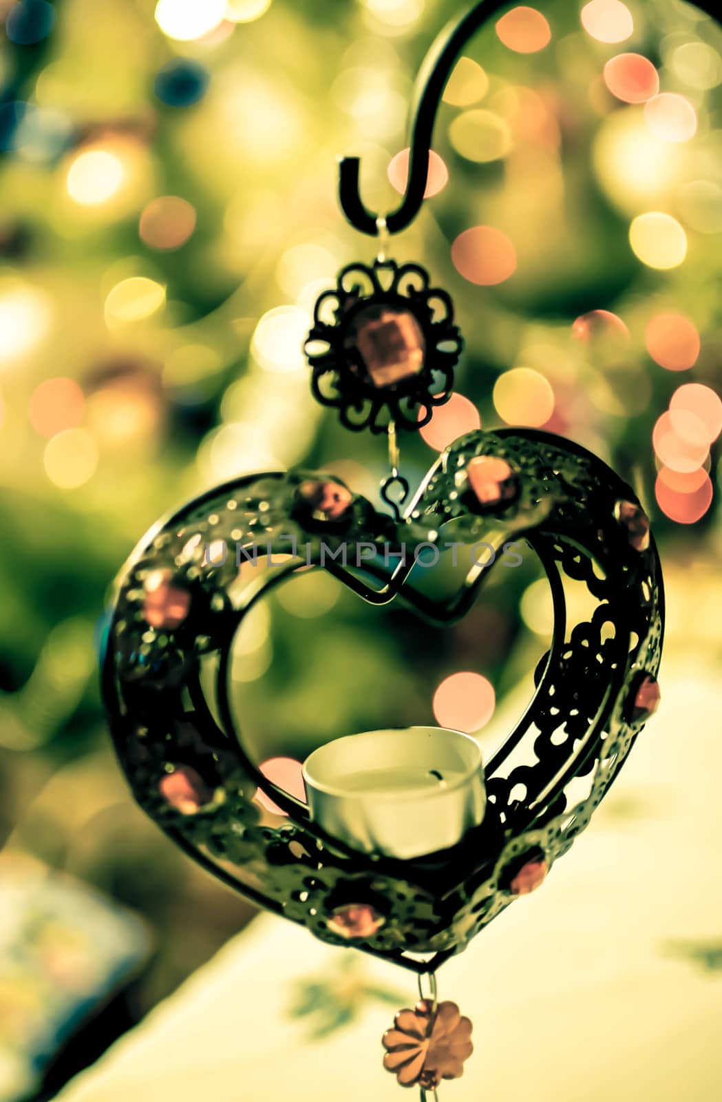 Iron heart with New Year lights, horizontal photo