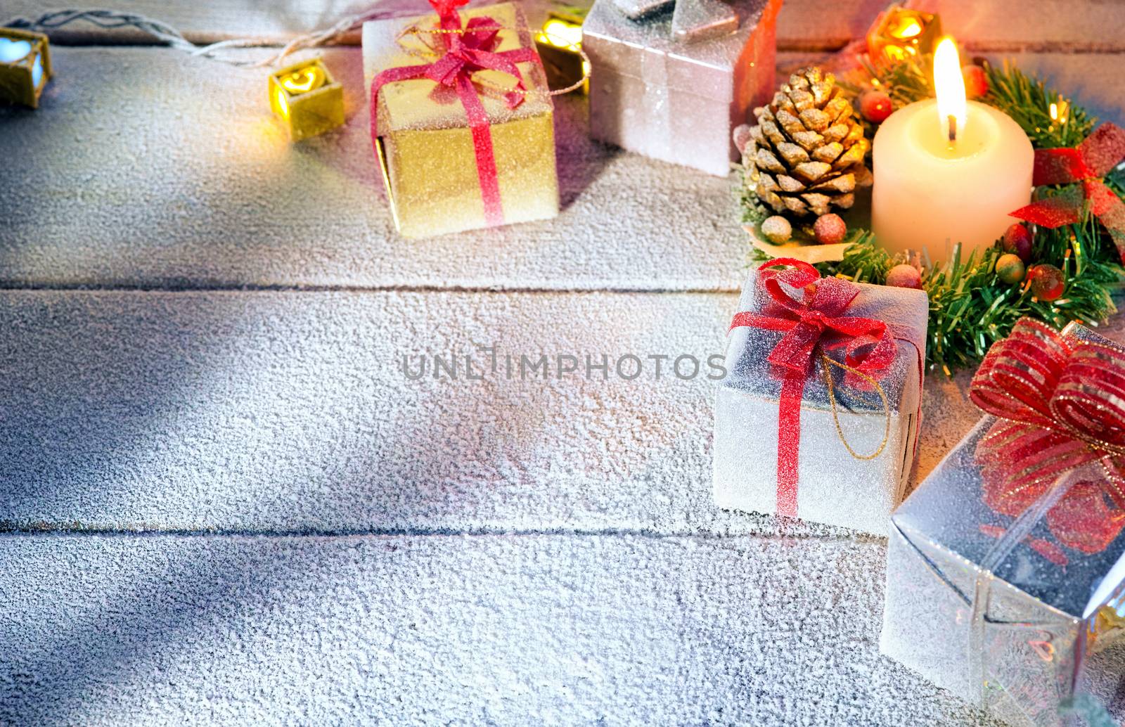 close up view  of gifts boxes  on snowbound  wooden back
