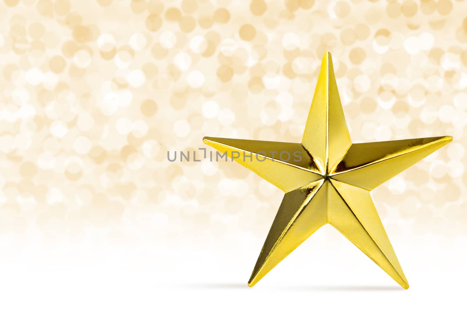 Christmas background. Golden star with lights snow winter background. 