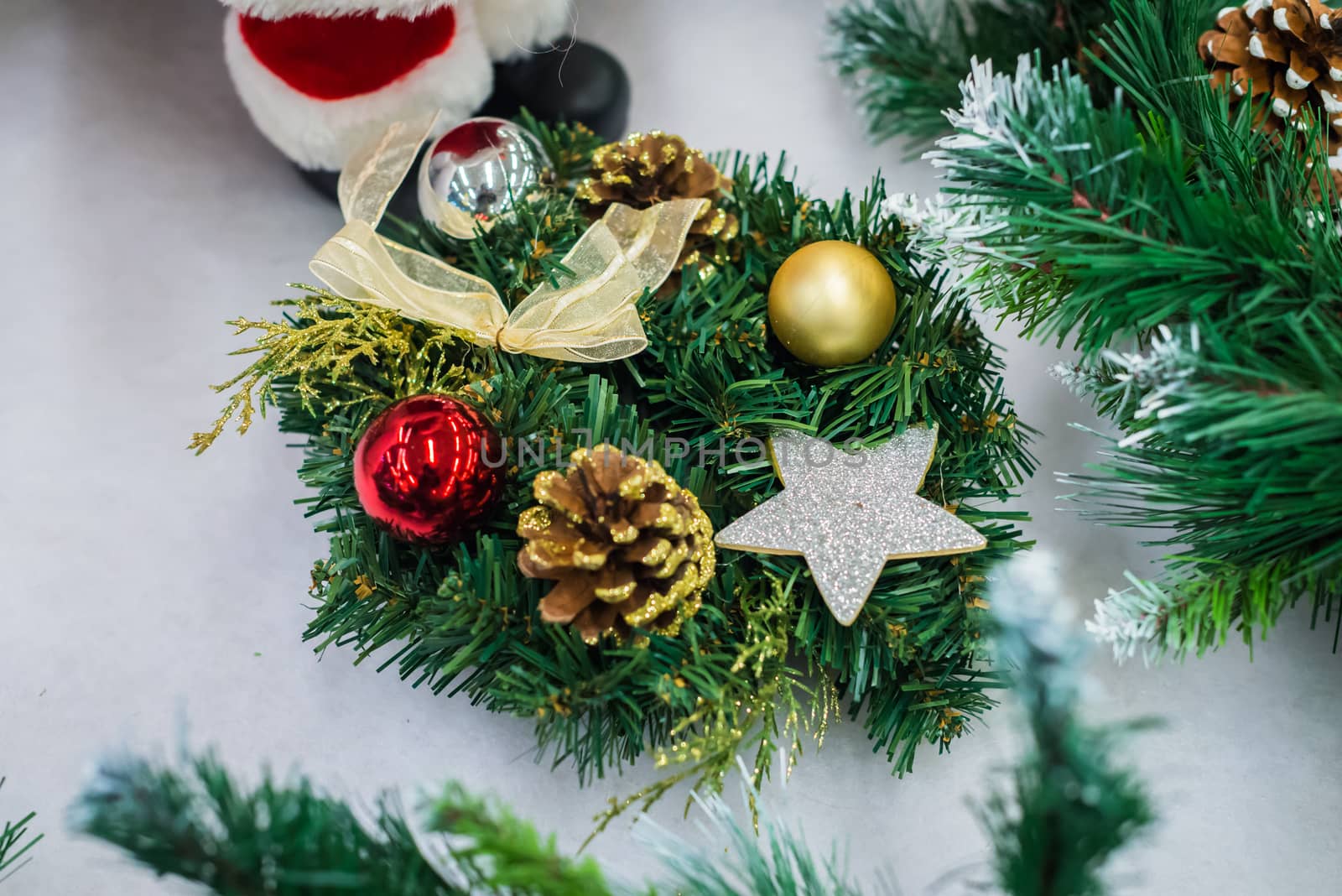 Christmas decorations on a Christmas tree. Small Christmas tree with toys