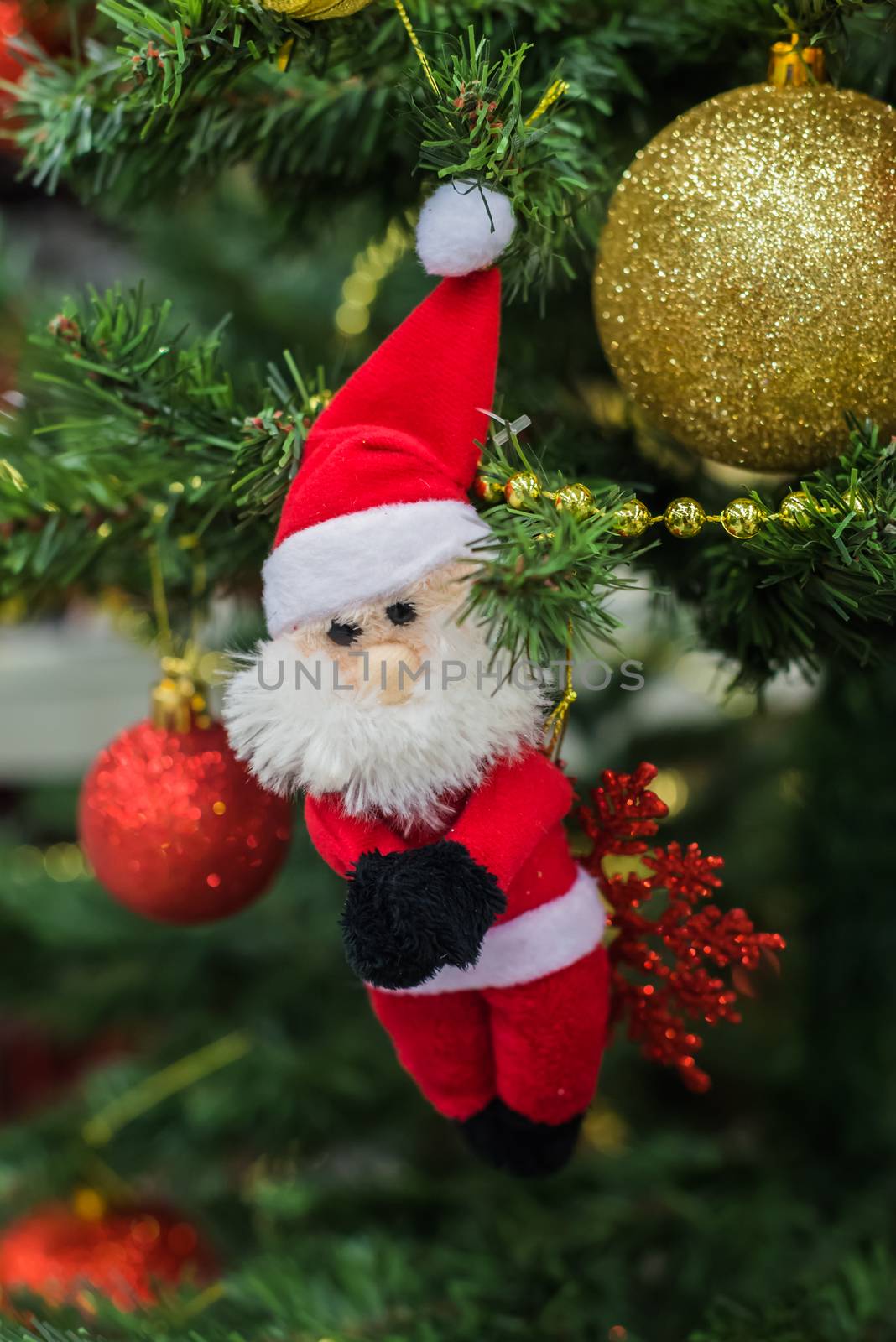 Christmas decorations on a Christmas tree. Christmas decorations like Santa Claus