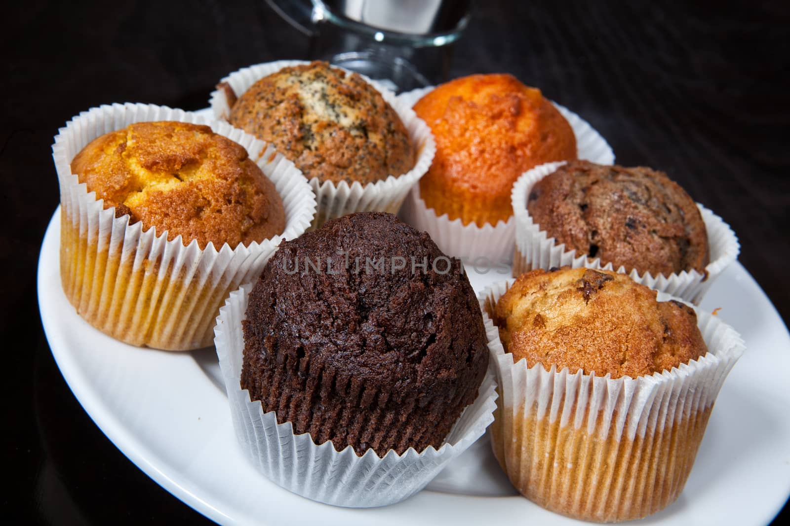 Different kinds of muffins on the kitchen table