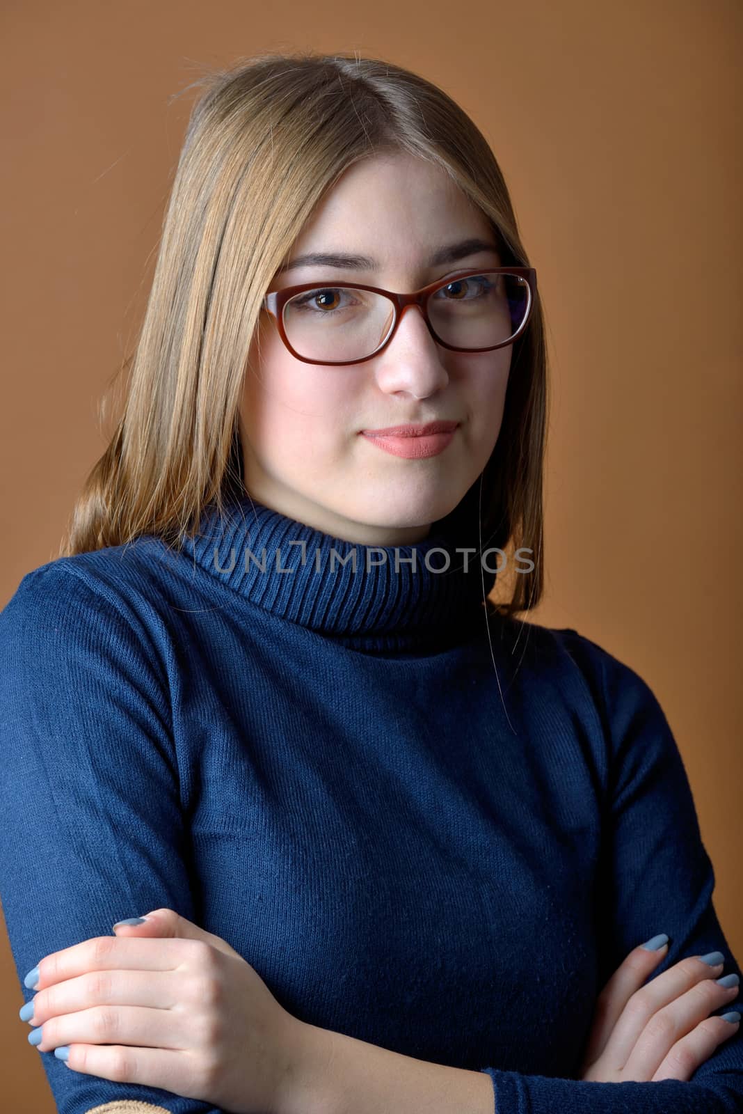 Portrait of beautiful teen girl in studio