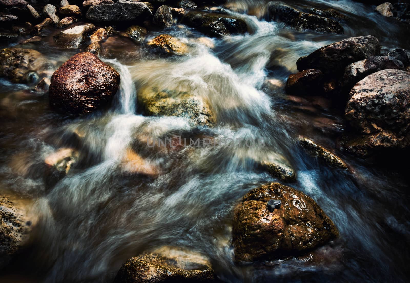 seasonal background autumn stream with wild white water