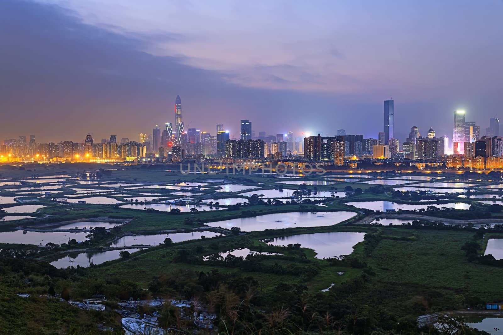 Shenzhen citscape at night , view from hiong kong countryside