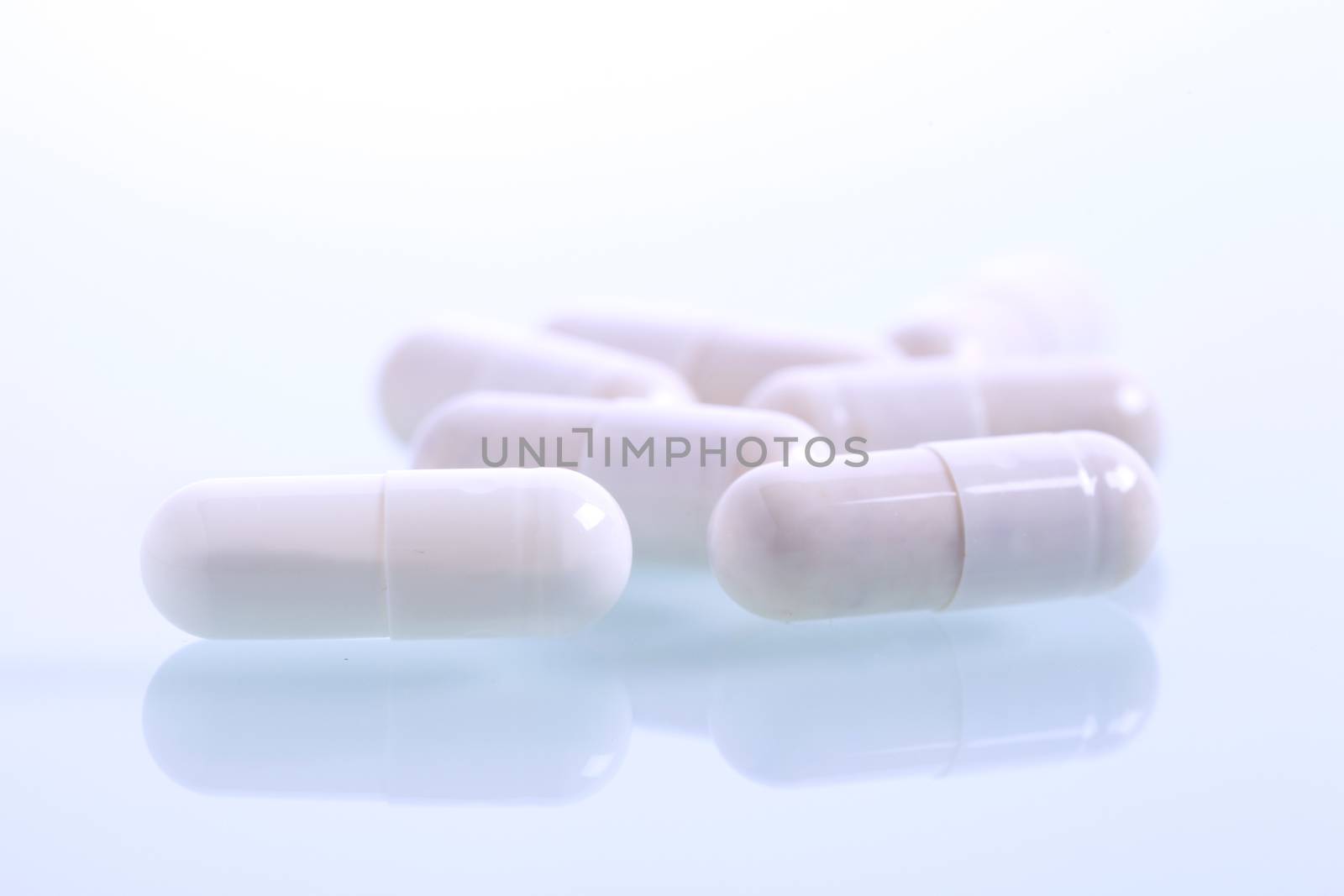 Set of capsules on white background. Studio Shot