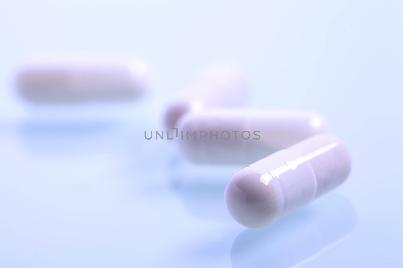 Set of capsules on white background. Studio Shot