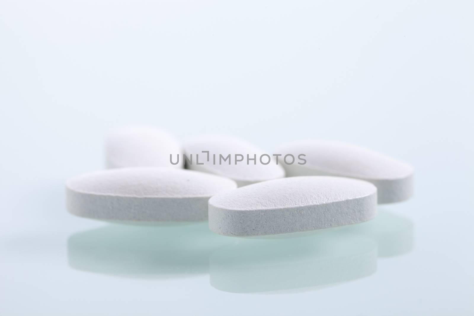 Set of capsules on white background. Studio Shot