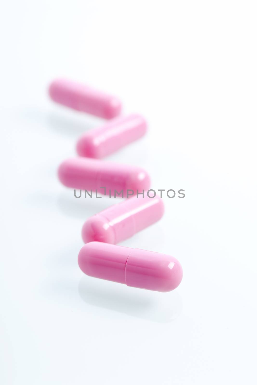 Set of capsules on white background. Studio Shot