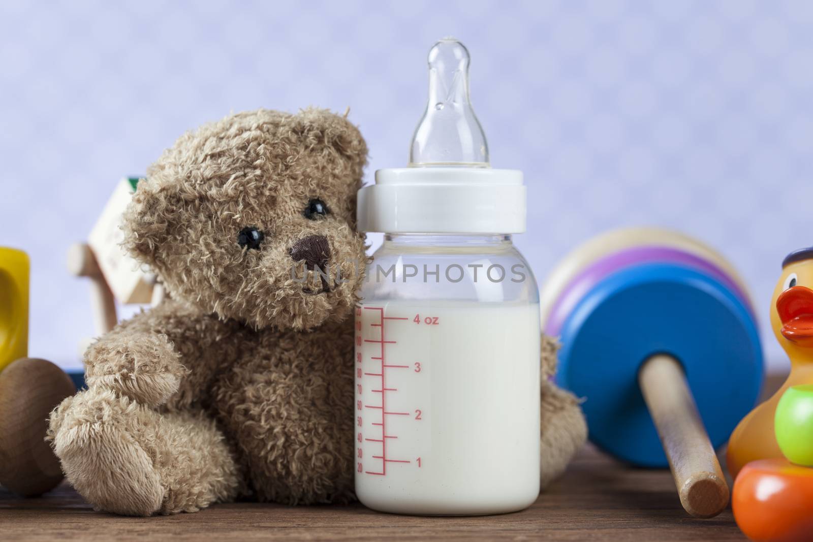 Children's World toy on a wooden background. Studio shot]