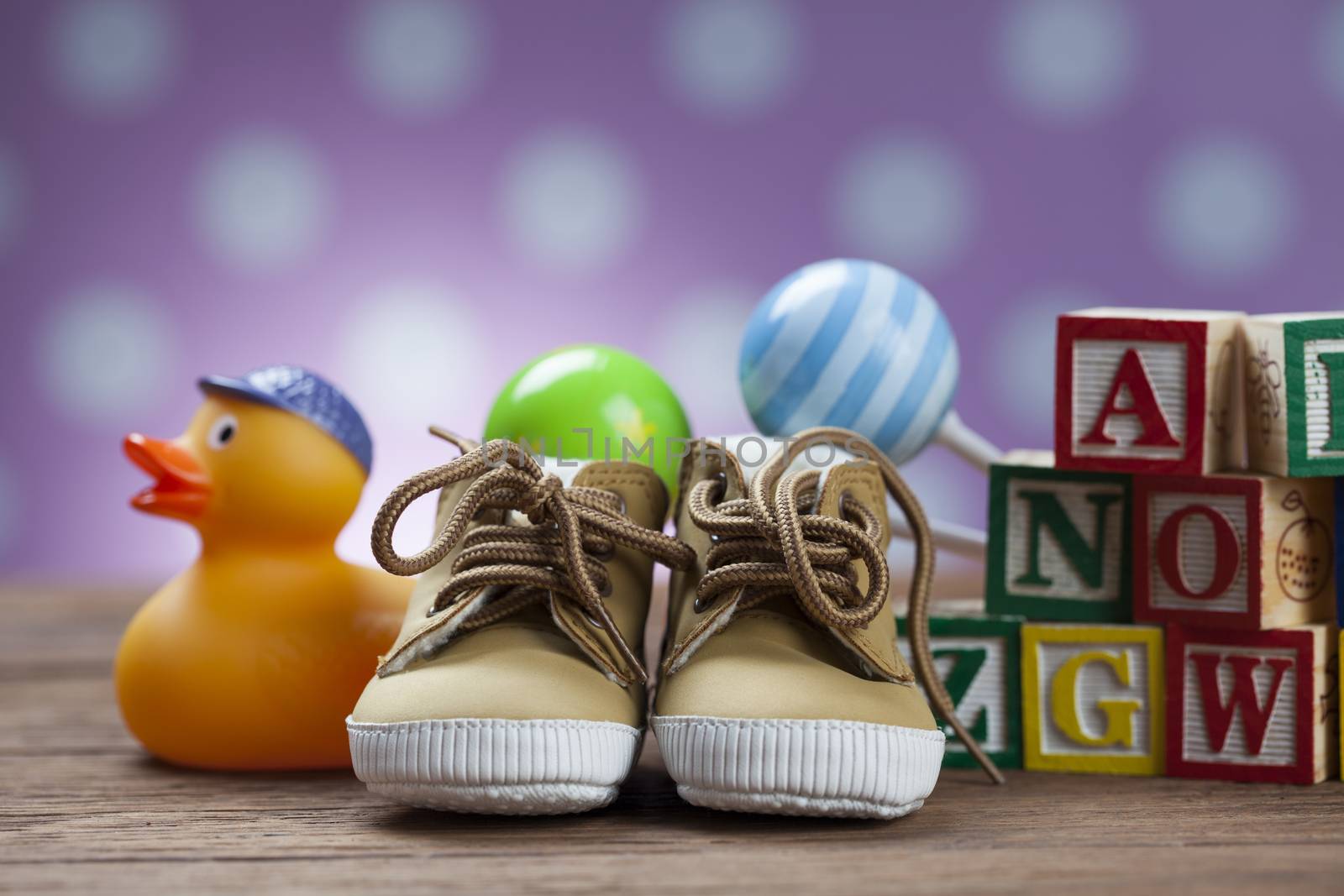 Children's World toy on a wooden background. Studio shot]