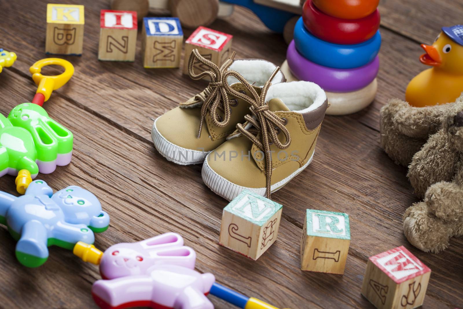 Children's World toy on a wooden background. Studio shot]