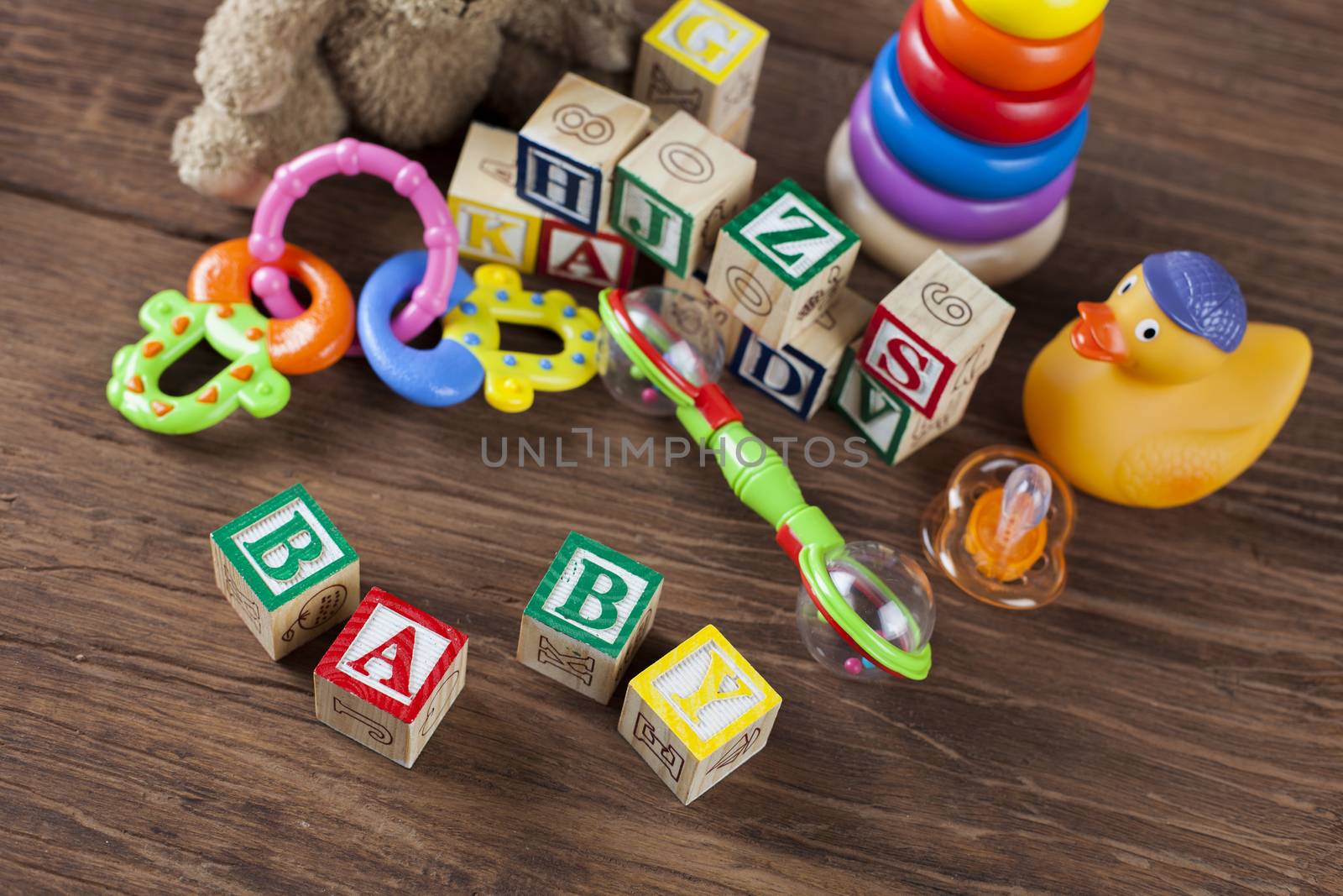 Children's World toy on a wooden background. Studio shot]