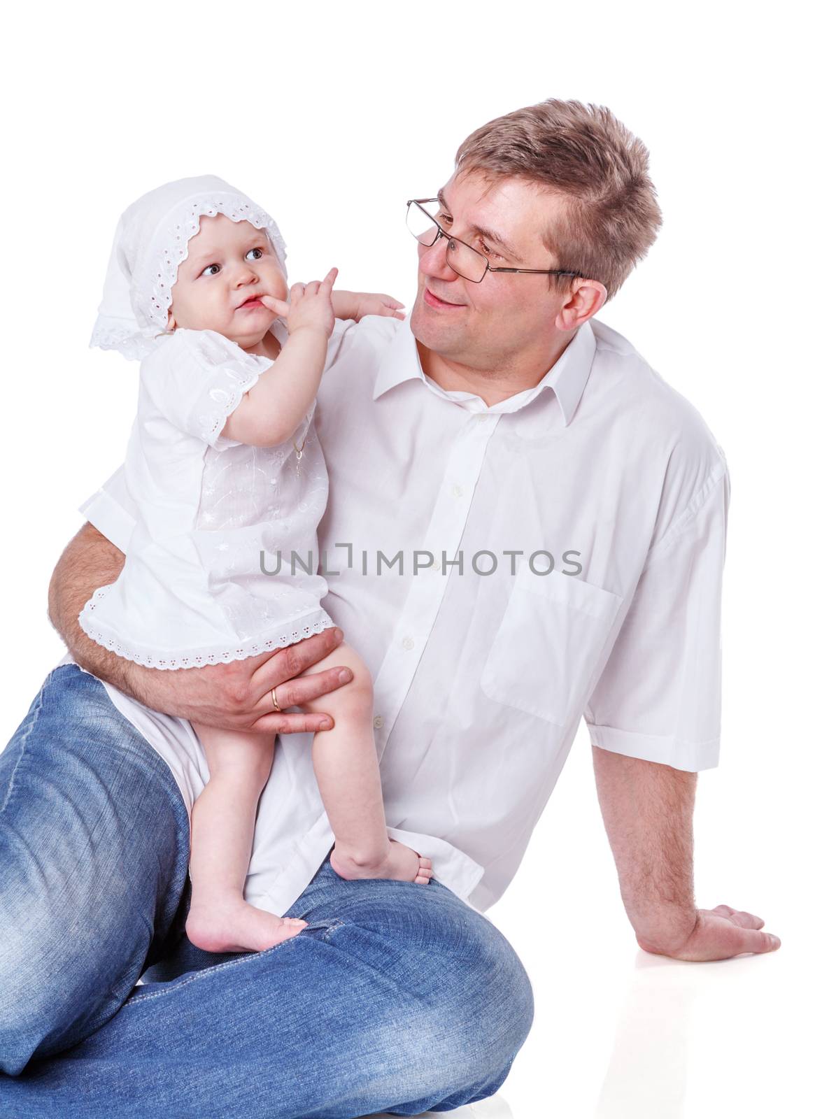 Father with baby girl posing isolated on white