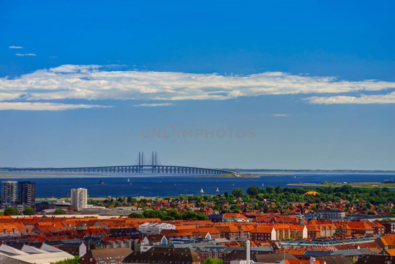 Panoramic aerial cityscape of Copenhagen city and Oresund Bridge Denmark by homocosmicos