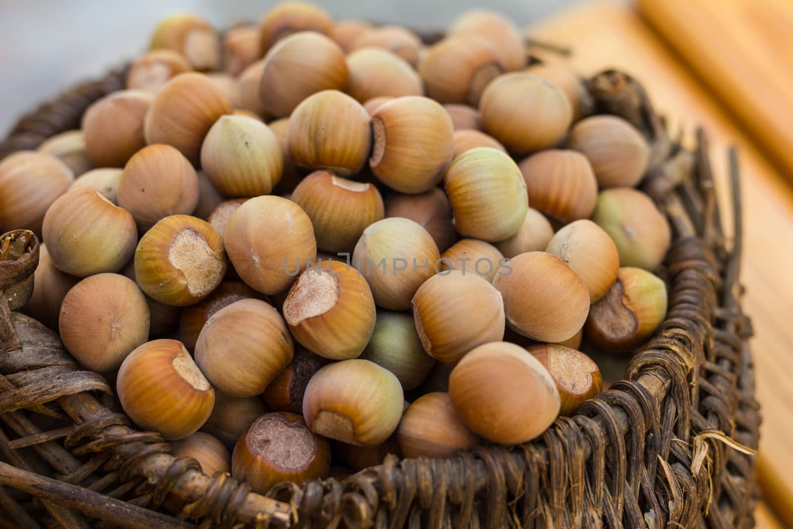 A basket of toasted hazelnuts inviting