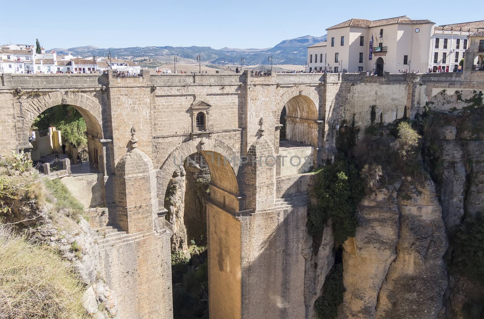 New Bridge over Guadalevin River in Ronda, Malaga, Spain. Popula by max8xam