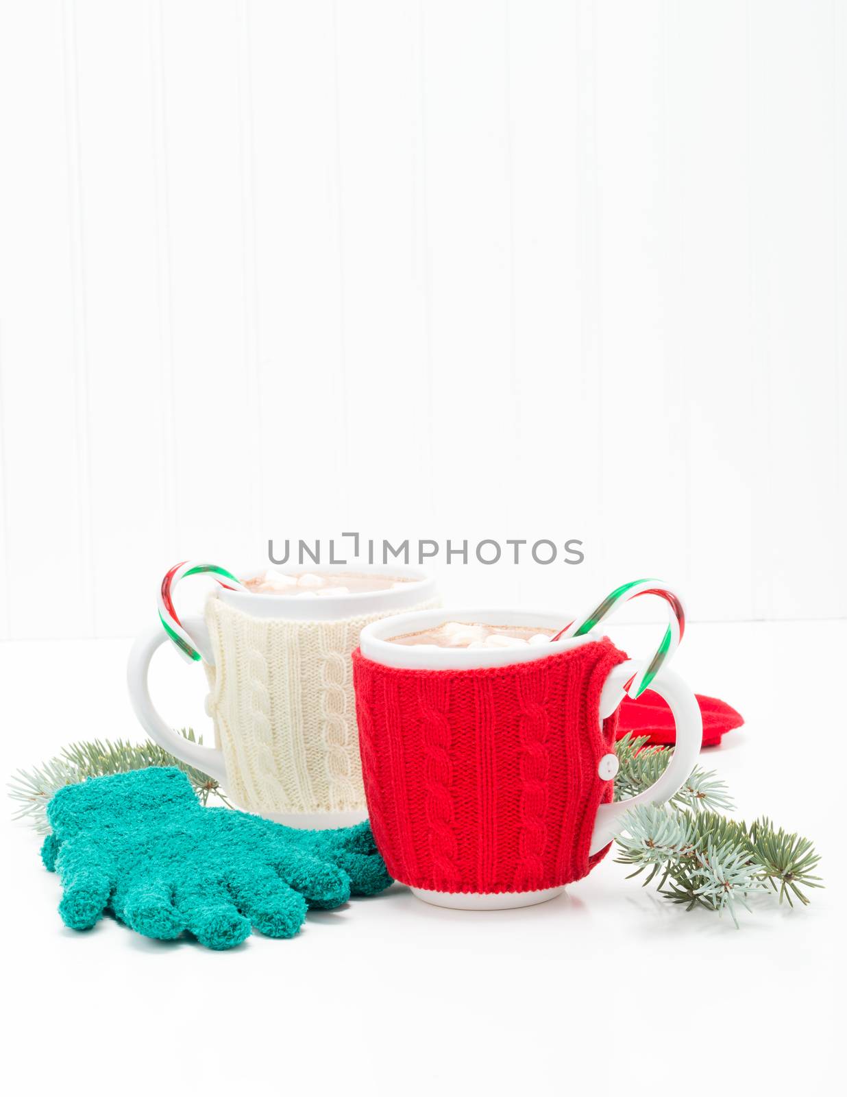 Two mugs of delicious candy cane flavored hot chocolate.