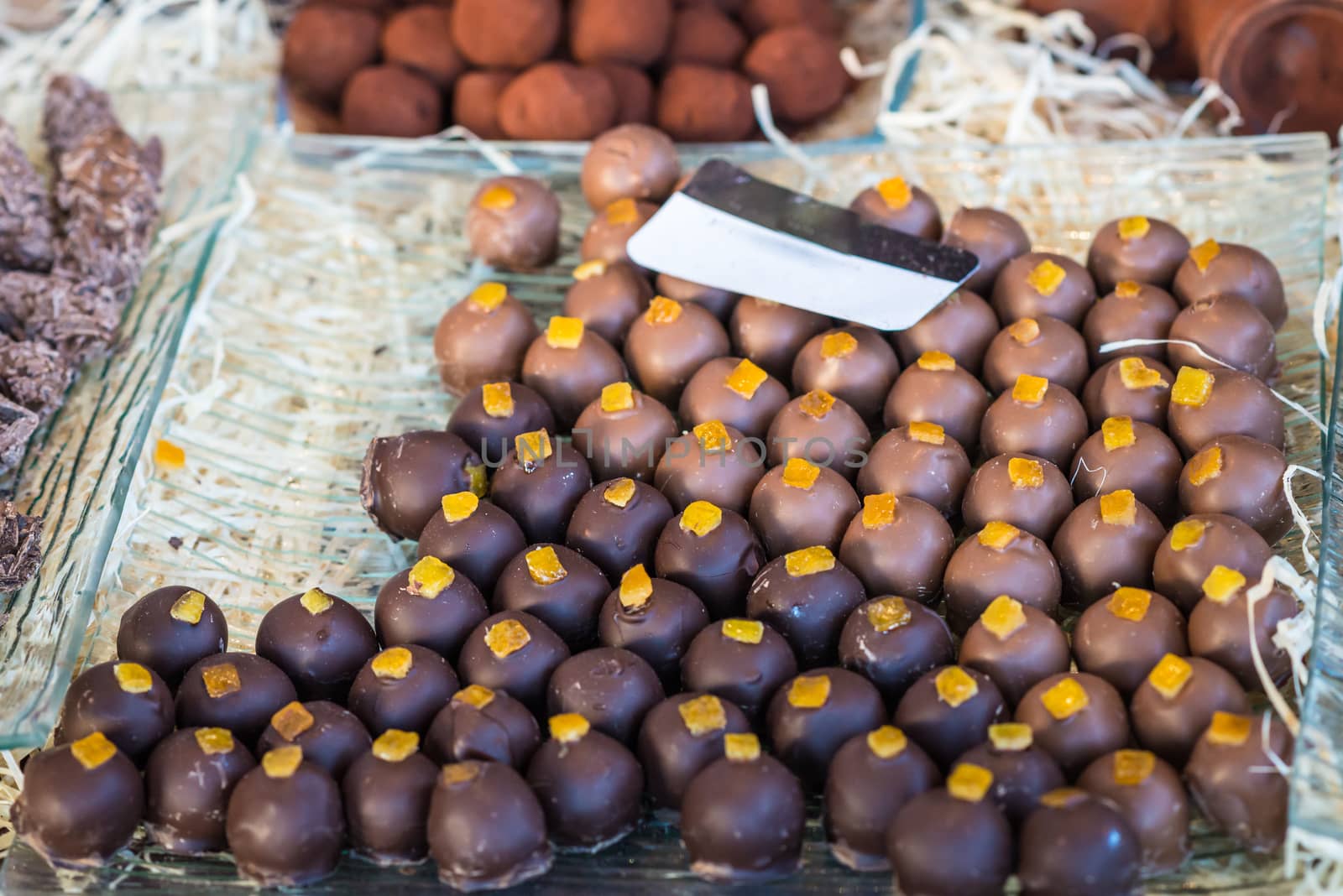 delicious mouthwatering chocolates on the counter outdoors