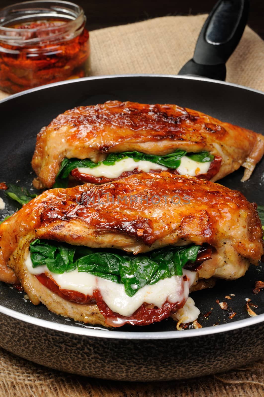 Stuffed breast baked with dried tomatoes, mozzarella, spinach
