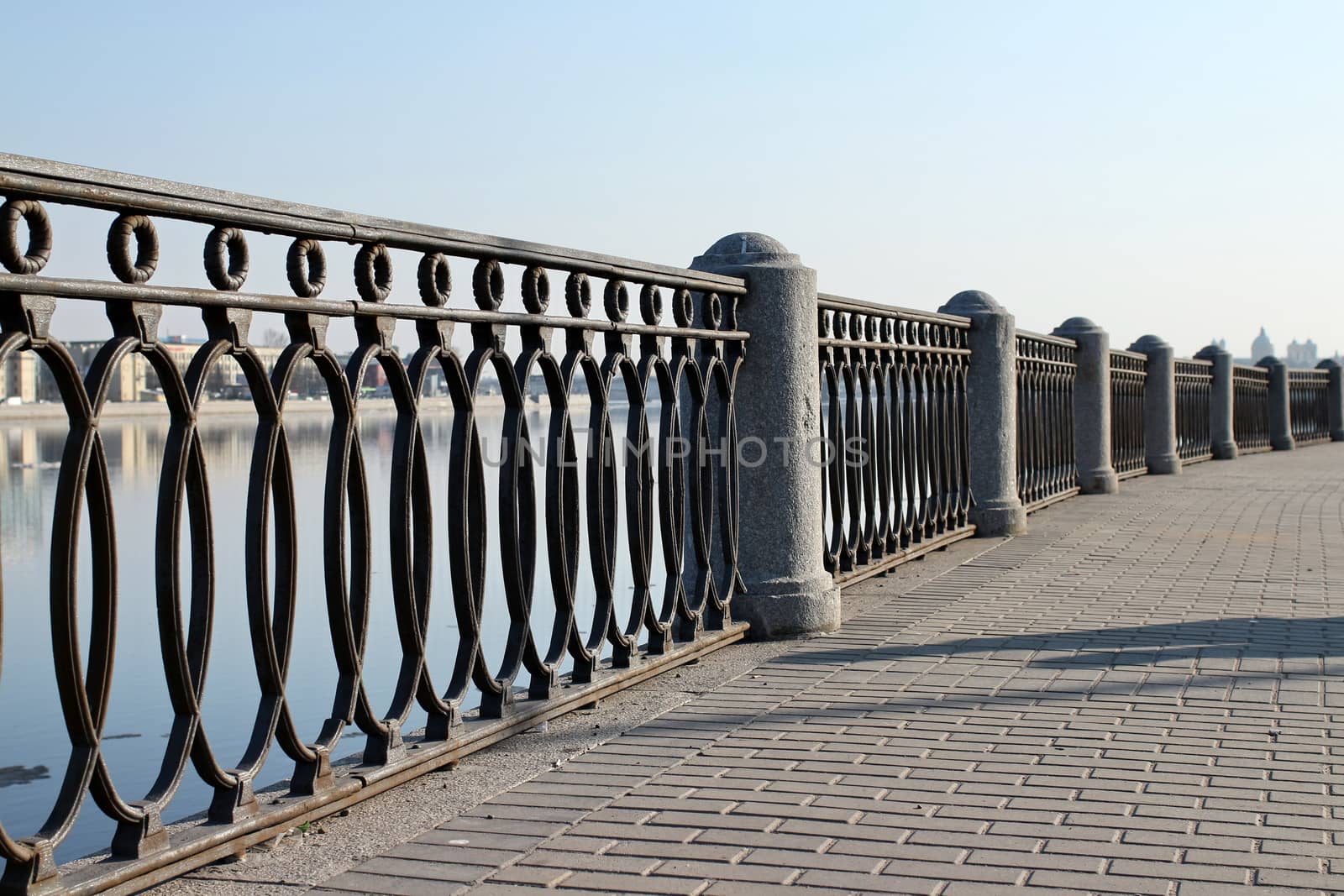 embankment fencing goes away into the distance