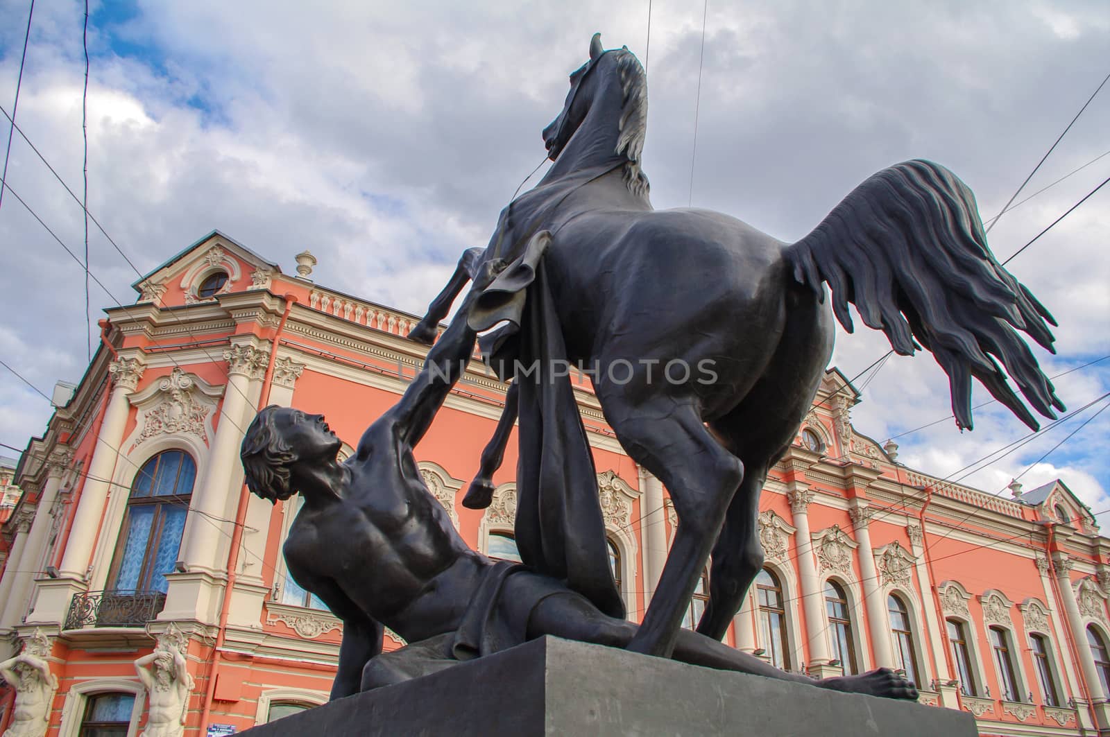 View of Horse tamers monument by Peter Klodt on Anichkov Bridge in Saint-Petersburg Russia. Popular touristic landmark. by evolutionnow