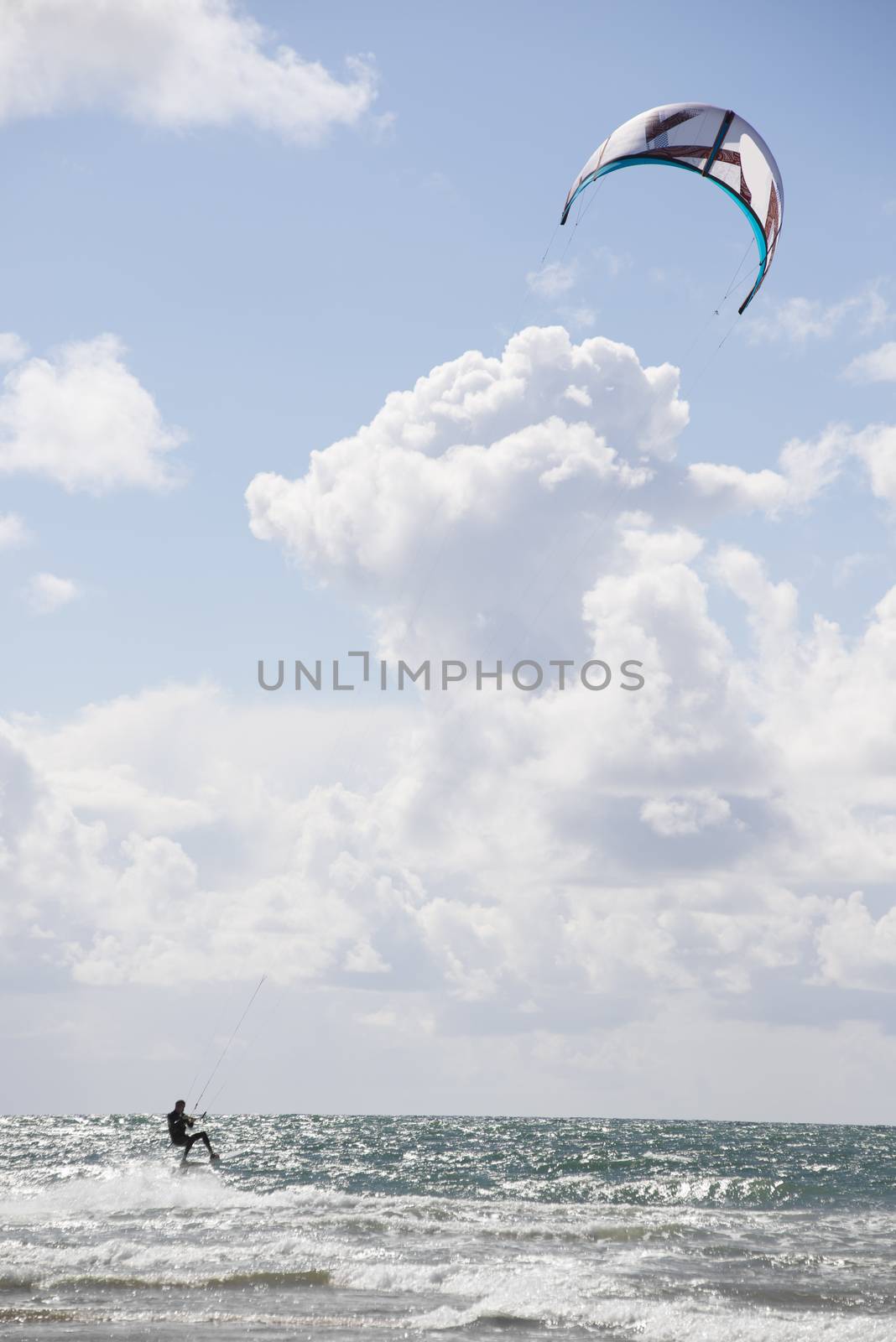 extreme kite surfer on beautiful waves at beach in ballybunion county kerry ireland on the wild atlantic way