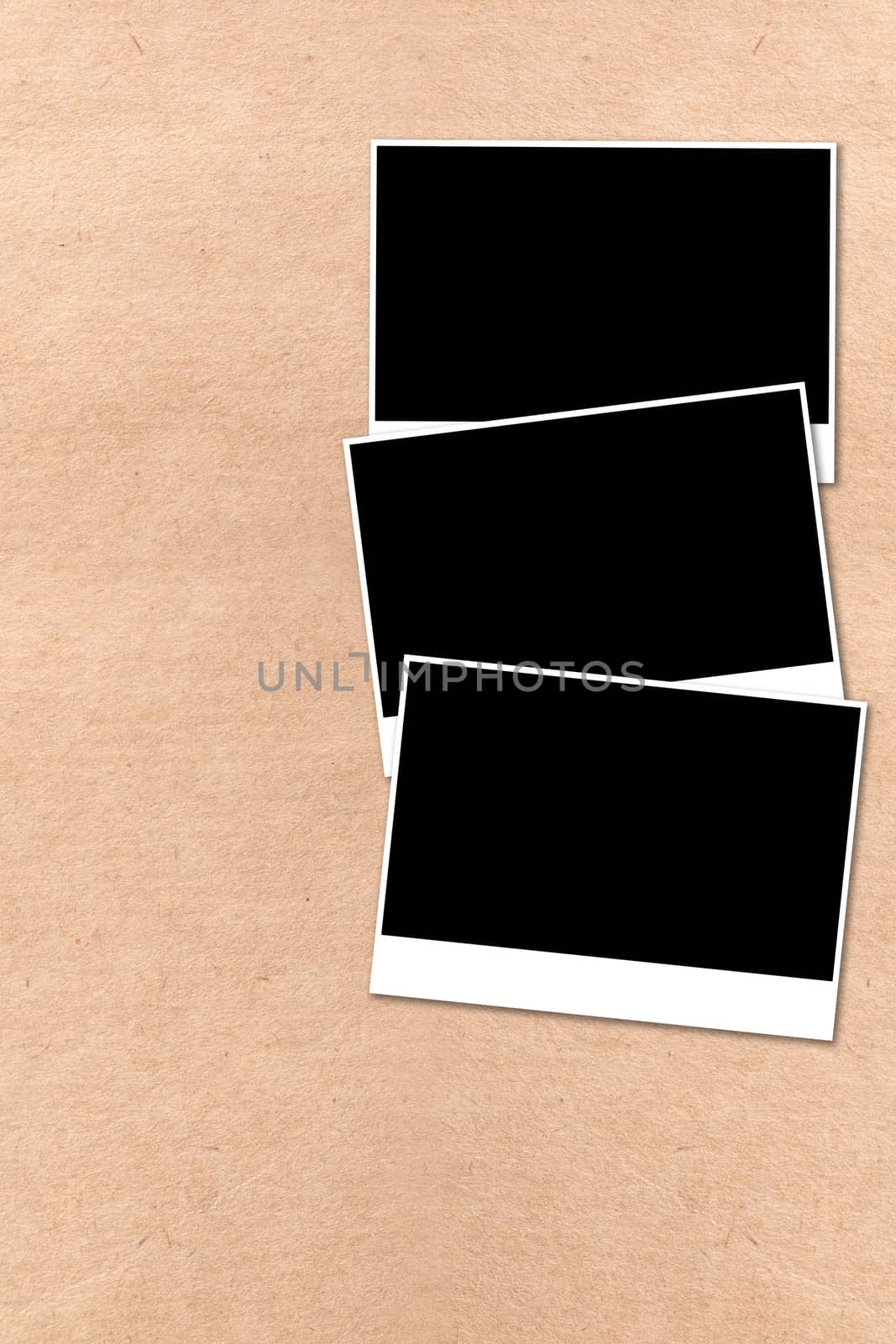 empty photographs on a background beige paper texture