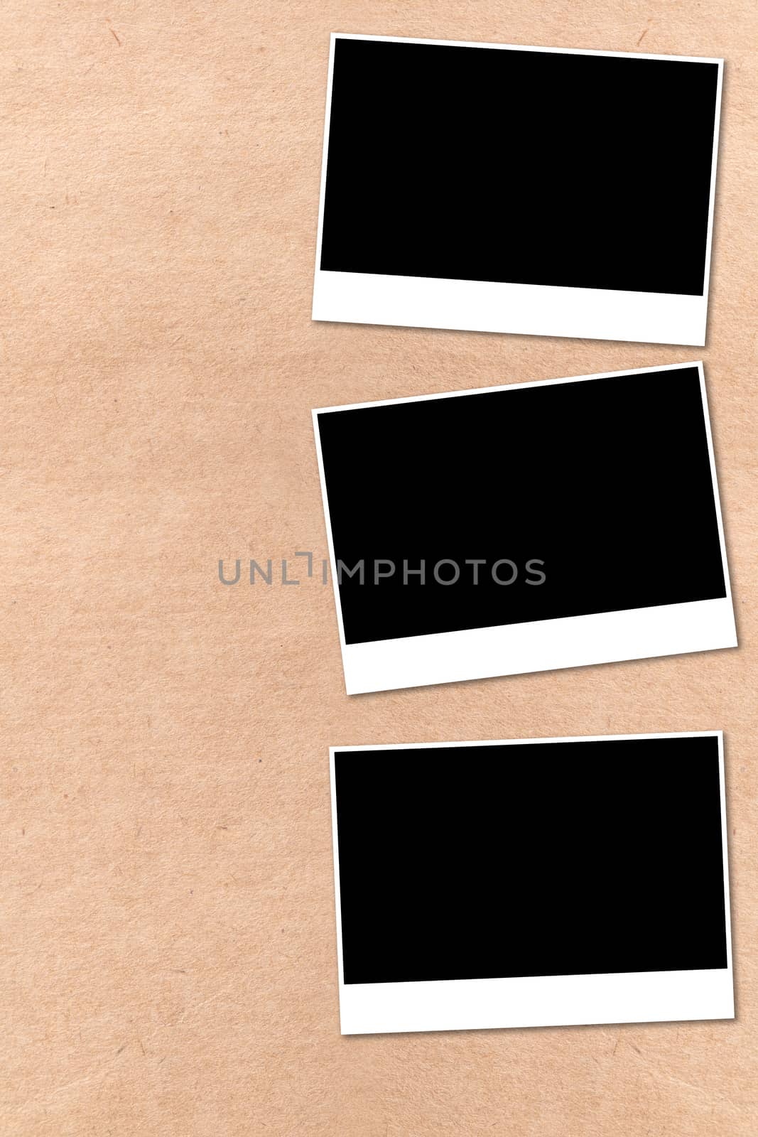 empty photographs on a background beige paper texture