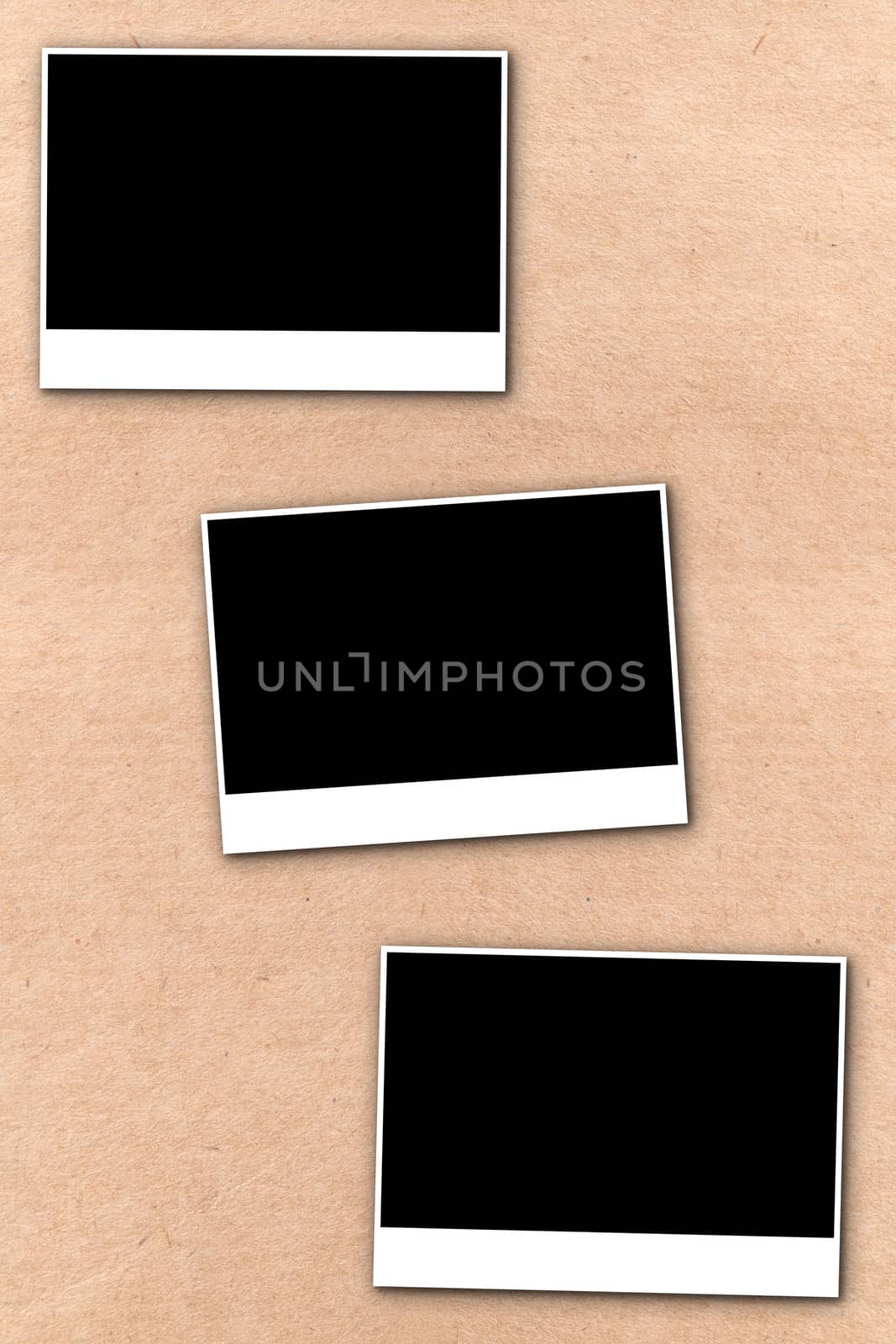 empty photographs on a background beige paper texture