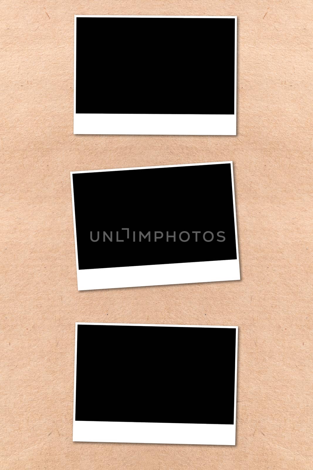 empty photographs on a background beige paper texture