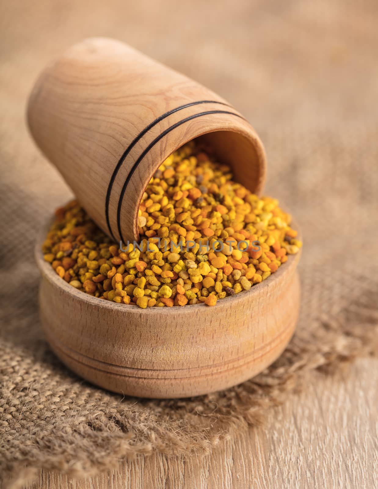 flower pollen in a wooden bowl, rustic style