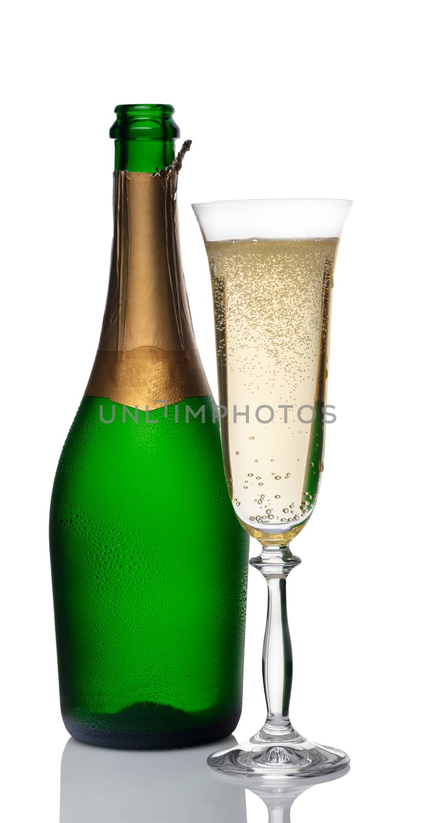 bottle and glasses of champagne on a white background