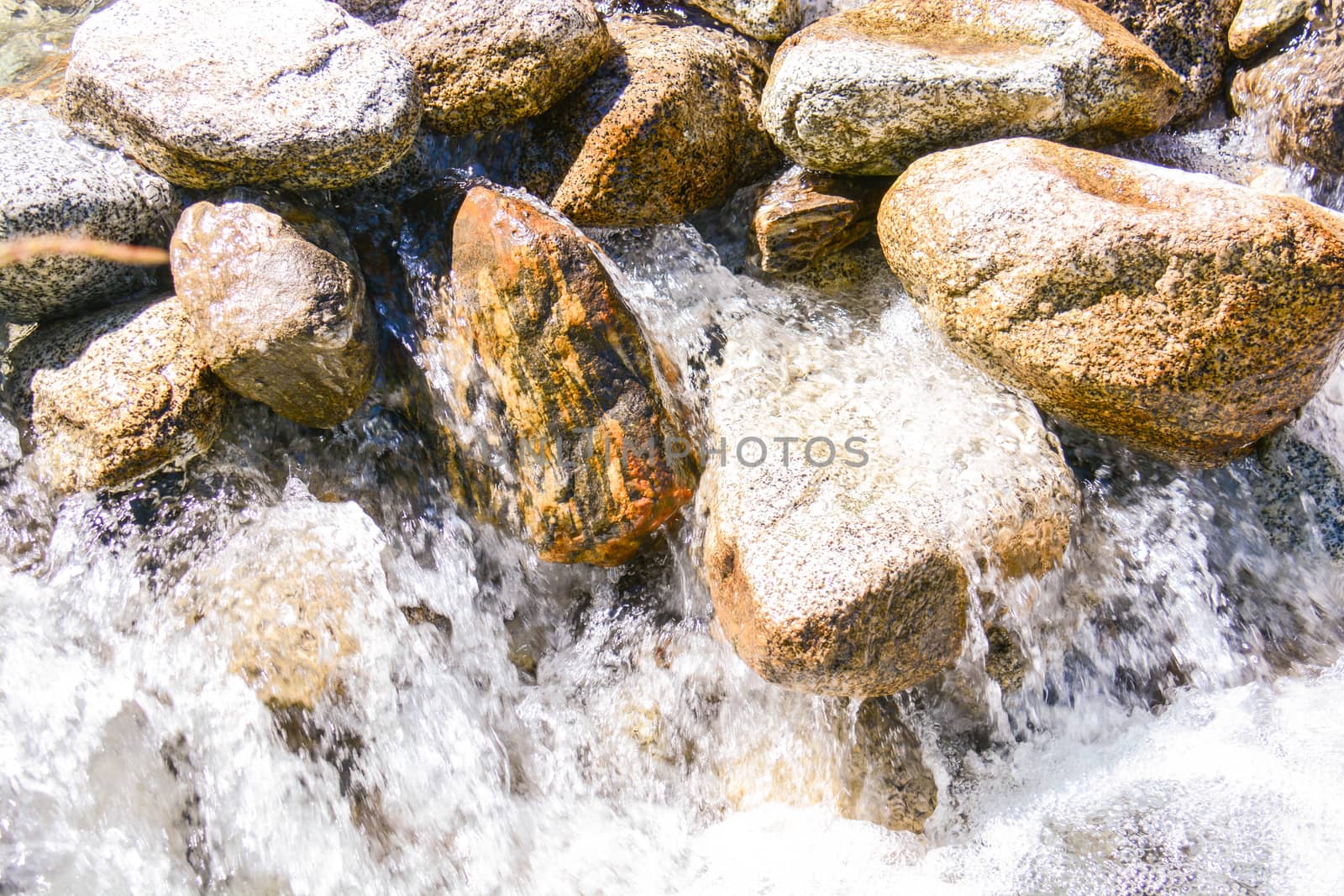 river and sea water stones as background
