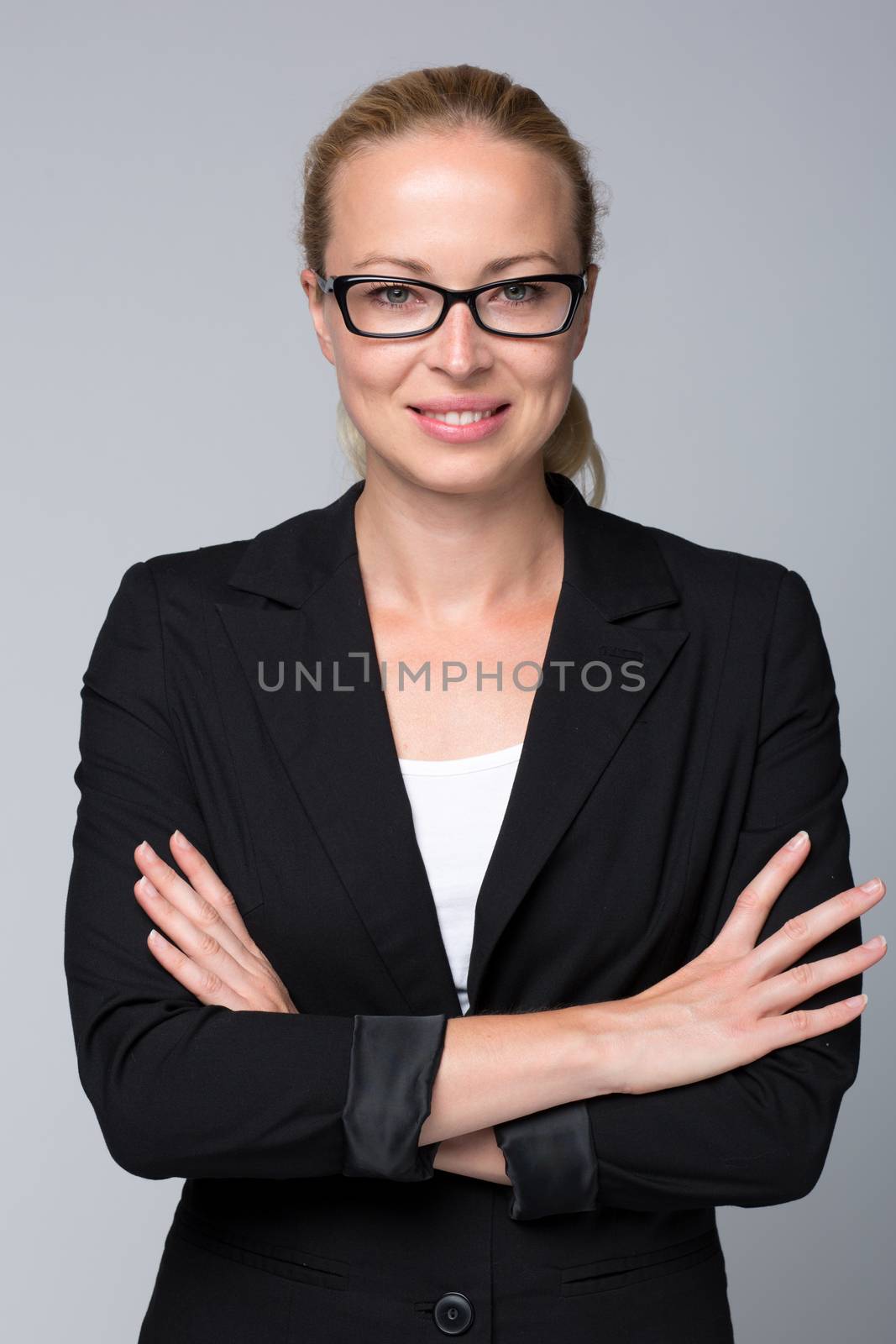 Beautiful young woman in business attire. by kasto