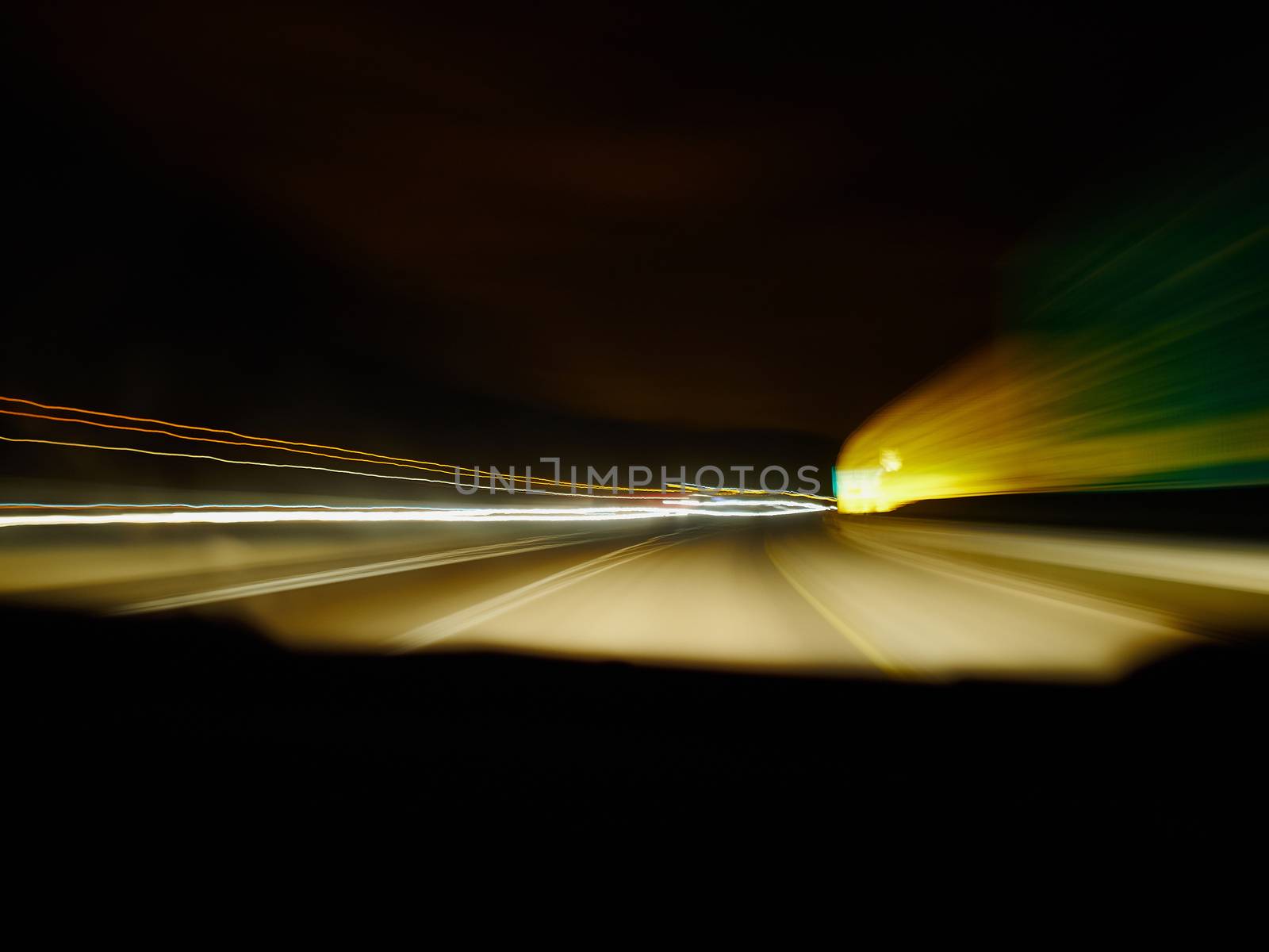 Driving at night scenery with colorful blurred lights background