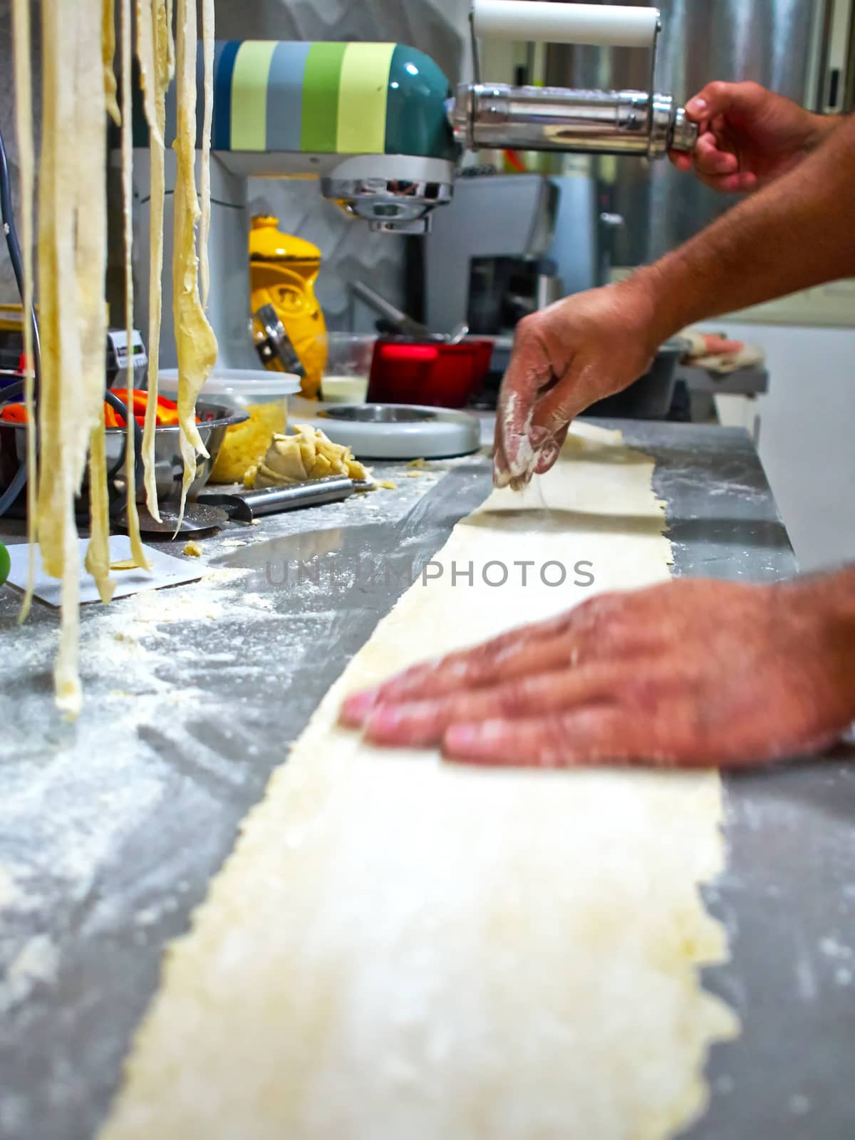 Close details of making traditional Italian homemade pasta noodles