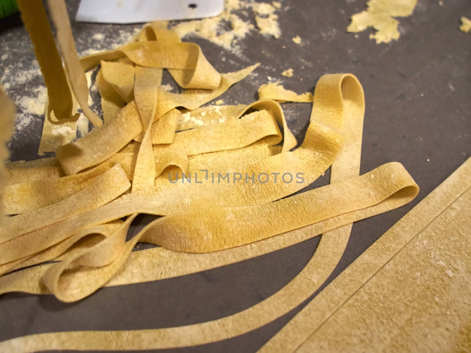 Close details of making traditional Italian homemade pasta noodles