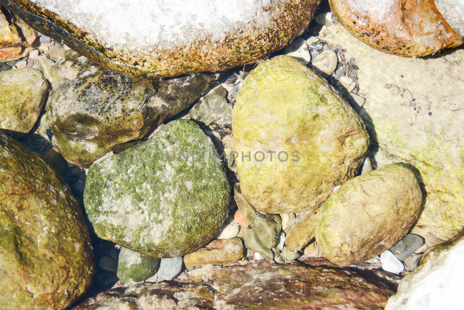 river and stones as background by iacobino